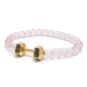 gold dumbbell bracelet with pink beads